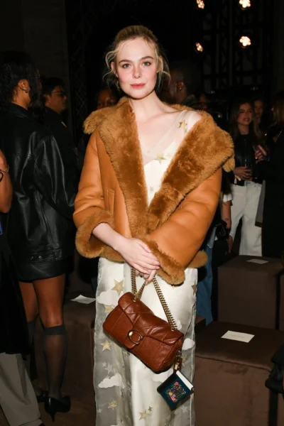 Elle Fanning at the Coach fashion show.