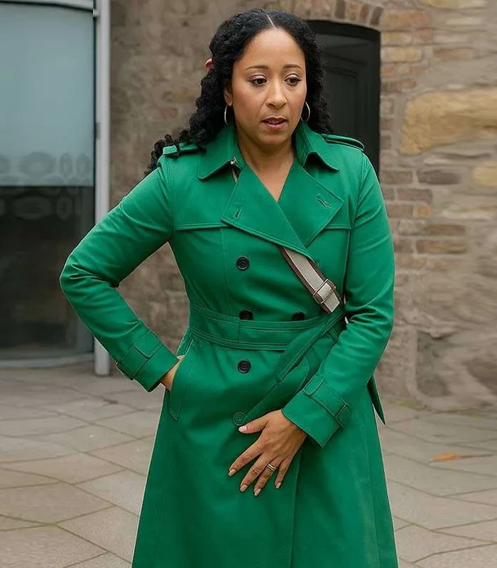 Haunted Harmony Mysteries Buried at C Tamera Mowry-Housley Green Coat