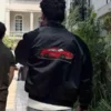 Nick Jonas black jacket
