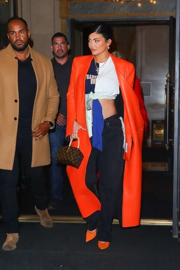 Kylie-Jenner-dazzles-in-an-orange-leather-jacket.webp