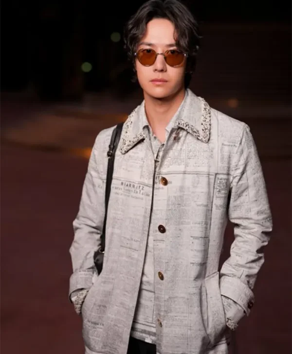 Paris-Fashion-Week-Wang-Yibo-Newspaper-Coat-600x729